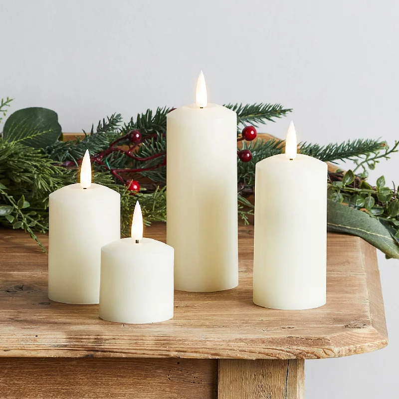 4 TruGlow® Ivory Slim Pillar Candles